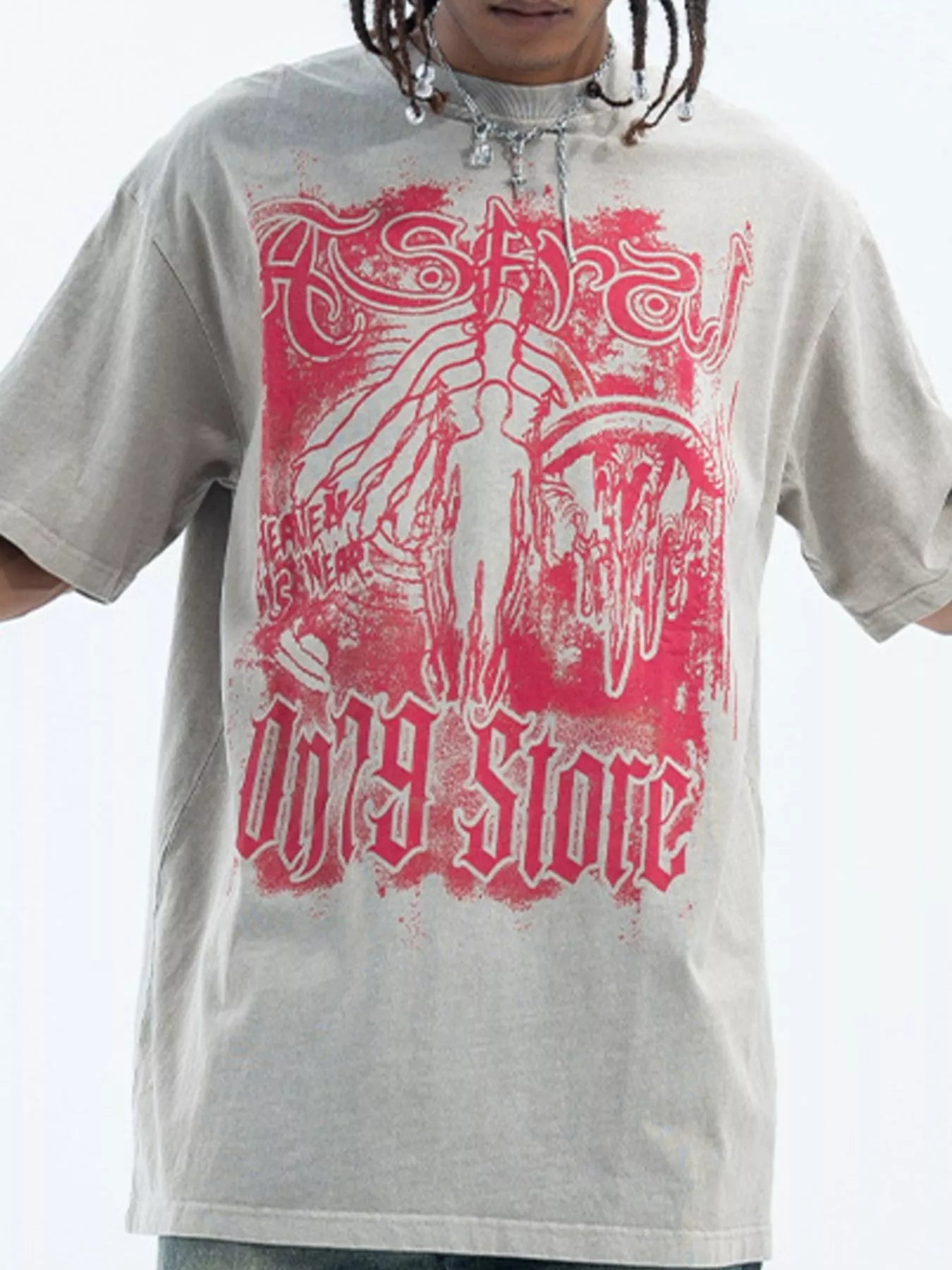Oversized streetwear t-shirt for men with bold red graphic print and abstract design.