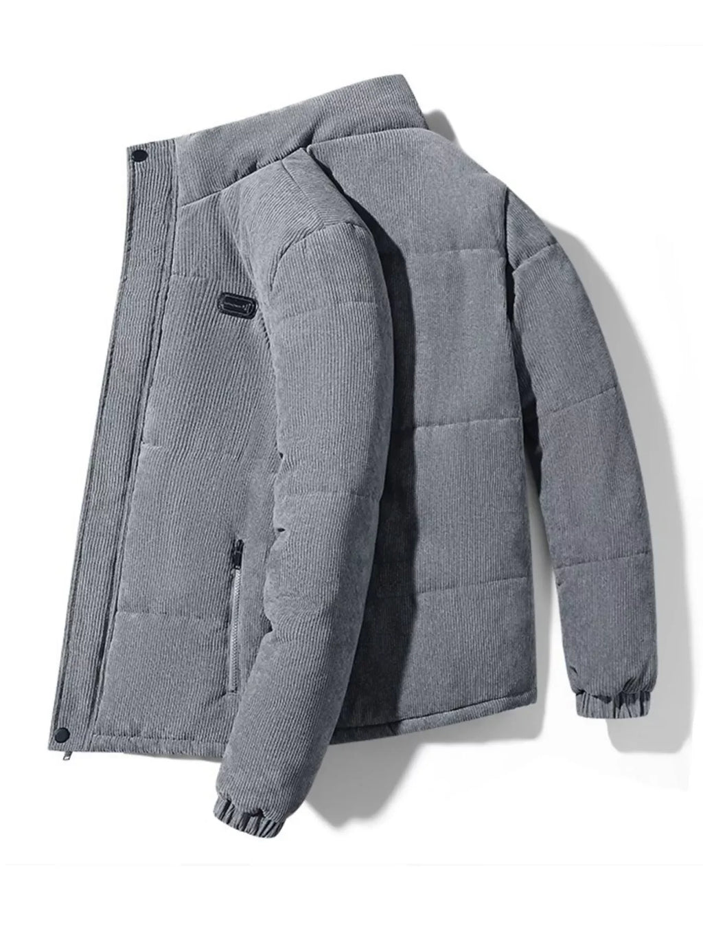 Men's plus size grey corduroy puffer jacket with zip pockets and elastic cuffs on a white background